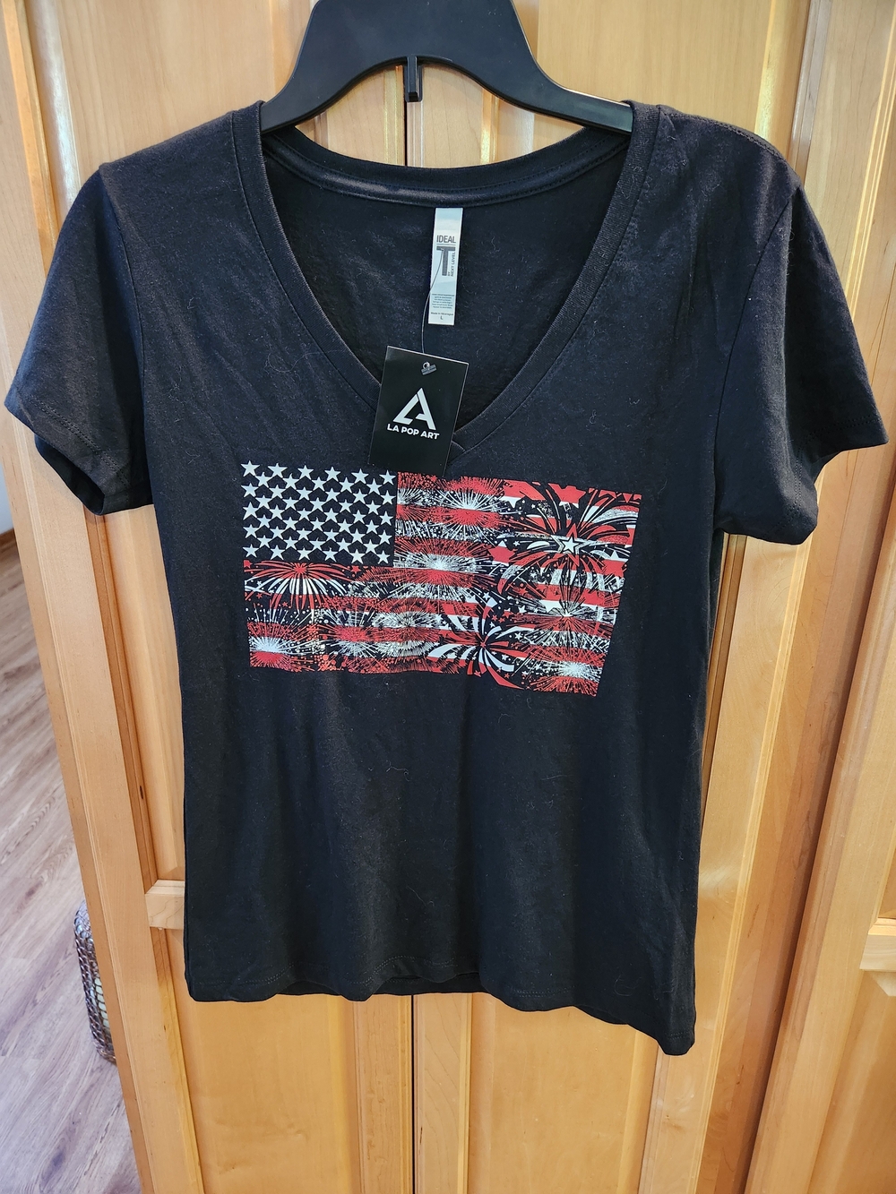 LA Pop Art Black V-Neck Tee with Red & White Flag Fireworks Graphic